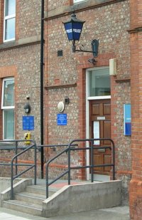 Blue lamp at police station entrance