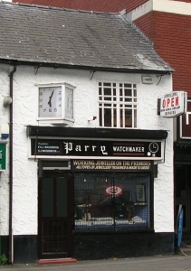 Typical clock makers shop with prominent exterior clock