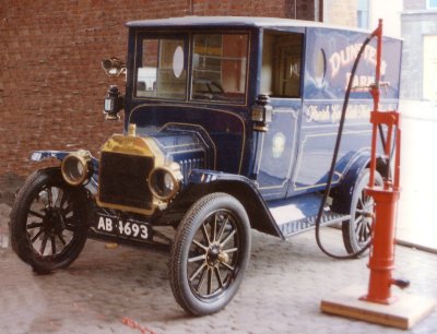 Photo showing Typical 1920s van and petrol pump