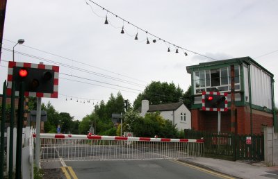 Photo of Cow bells still in place at a barrier crossing in 2007