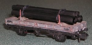 Photo of Unflanged steel pipe load on bolster wagon